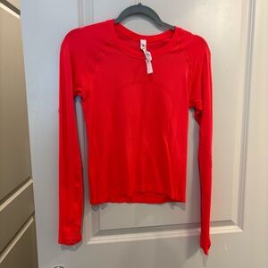 Swiftly Tech Long-Sleeve Shirt 2.0
Waist Length Red